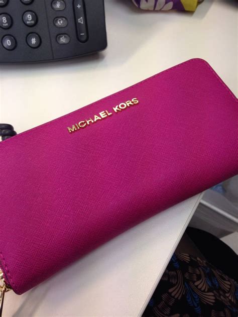 michael kors iphone wallet pink|Michael Kors hot pink wallet.